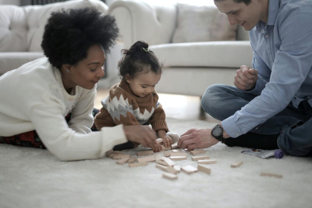 parents playing with kid